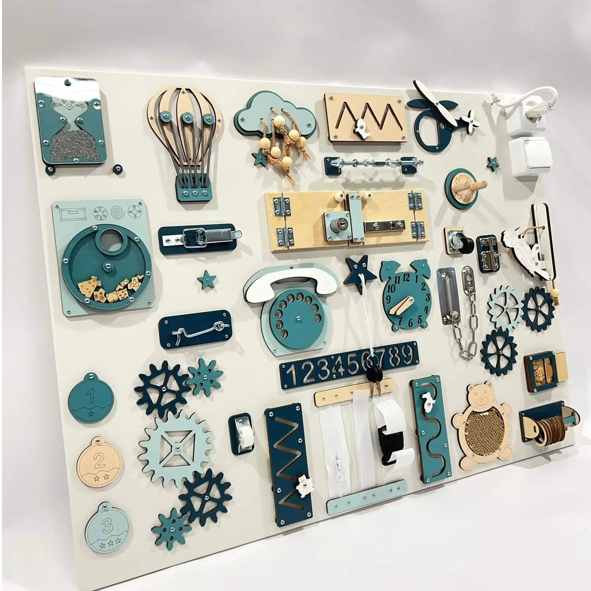 Children's activity board with various educational elements on a white background