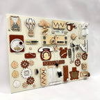 Wooden toy board with various educational elements on a white background