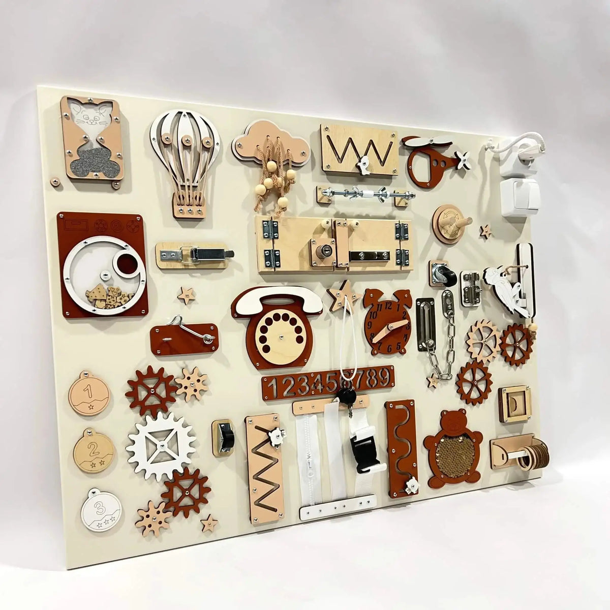 Wooden toy board with various educational elements on a white background