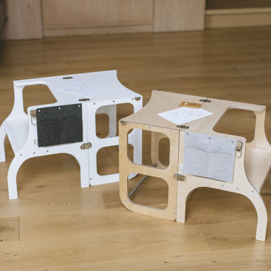 Montessori-inspired wooden kids furniture with felt pencil case pockets on wood floor