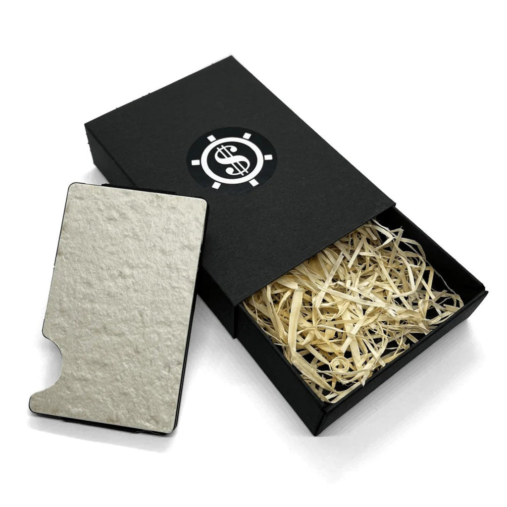 Eco-friendly card holder with textured white cover in a black gift box with straw filling