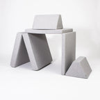 Gray geometric cushion set on a white background