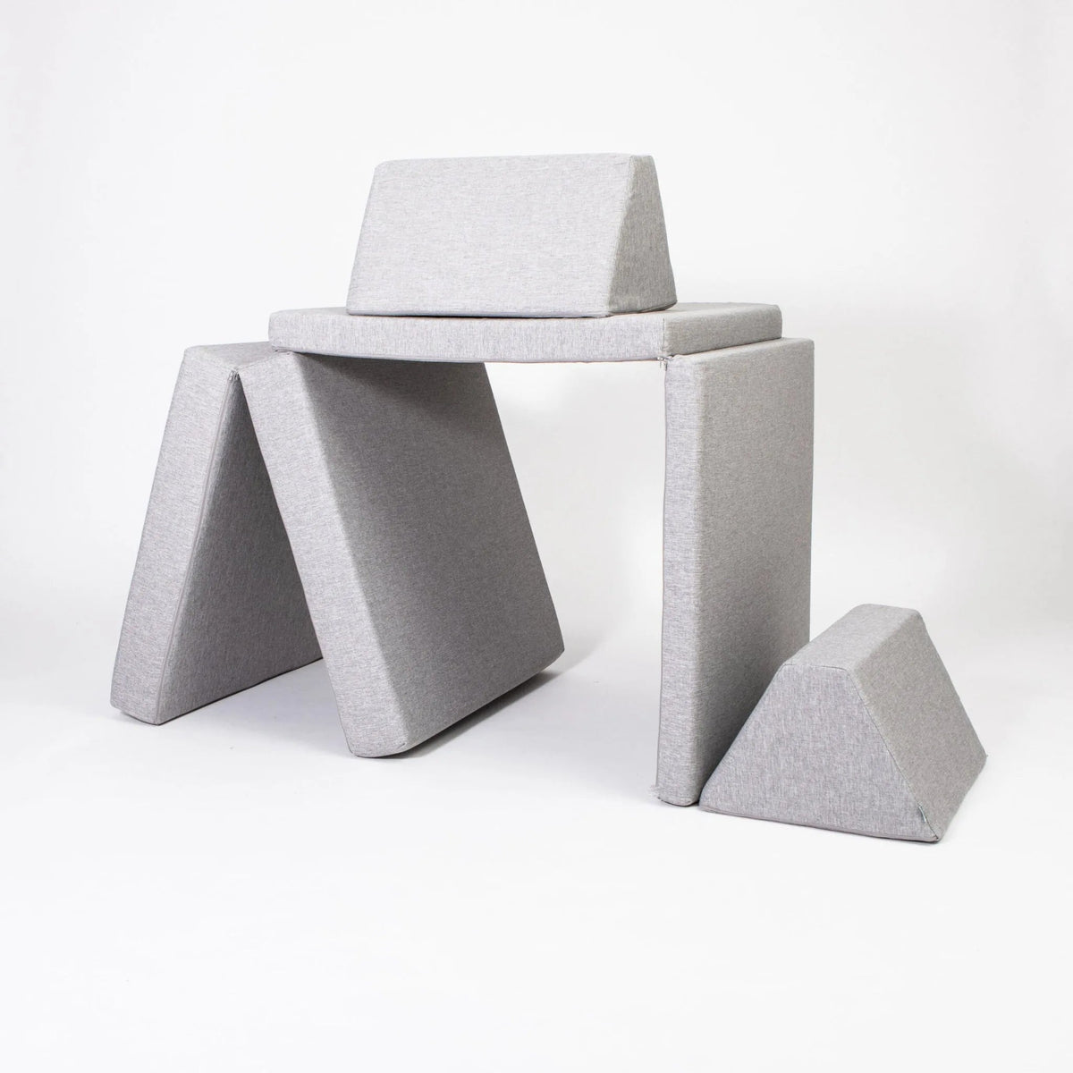 Gray geometric cushion set on a white background