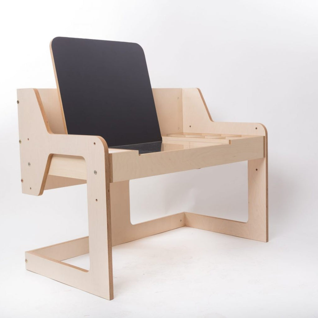 Modern Montessori-inspired wooden art desk with a black chalkboard panel