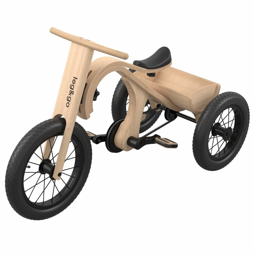 Children's tricycle with wooden frame and black seat on a white background